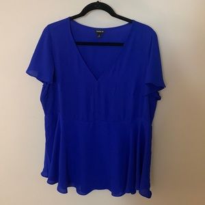Royal blue flowy short sleeve blouse with flare hem